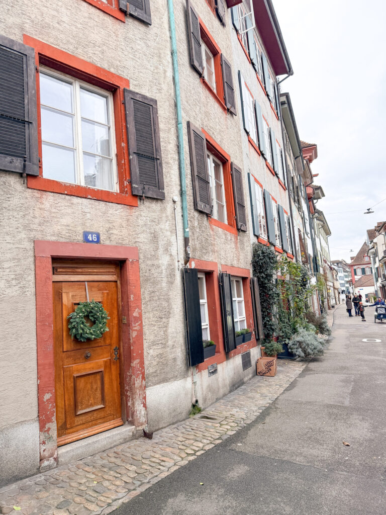 Basel Switzerland at Christmas TIme - A Complete Guide | Why I will always take a European Christmas Market trip every year | Top European Christmas Market to avoid massive crowds | Best Christmas Markets in Switzerland | Reasons to book a Flytographer photo shoot in Europe at Christmas time | Best five star hotels in Basel Switzerland | Top things to see and do in Basel at Christmas time | What to wear to the Basel Christmas market | How many days to spend in Basel for Christmas market trip | Where to find the Magical Christmas Courtyards in Basel 