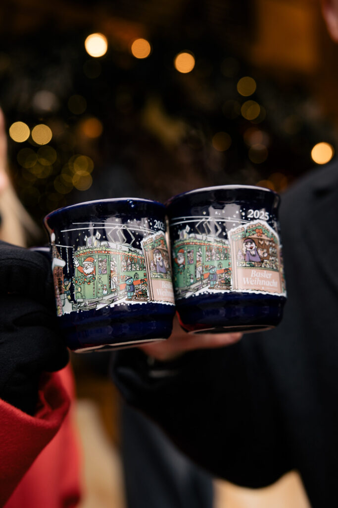 Basel Switzerland at Christmas TIme - A Complete Guide | Why I will always take a European Christmas Market trip every year | Top European Christmas Market to avoid massive crowds | Best Christmas Markets in Switzerland | Reasons to book a Flytographer photo shoot in Europe at Christmas time | Best five star hotels in Basel Switzerland | Top things to see and do in Basel at Christmas time | What to wear to the Basel Christmas market | How many days to spend in Basel for Christmas market trip | Where to find the Magical Christmas Courtyards in Basel | Visiting Basel Minster and what you need to know before climbing the tower | Visiting the Christmas Market in Basel 