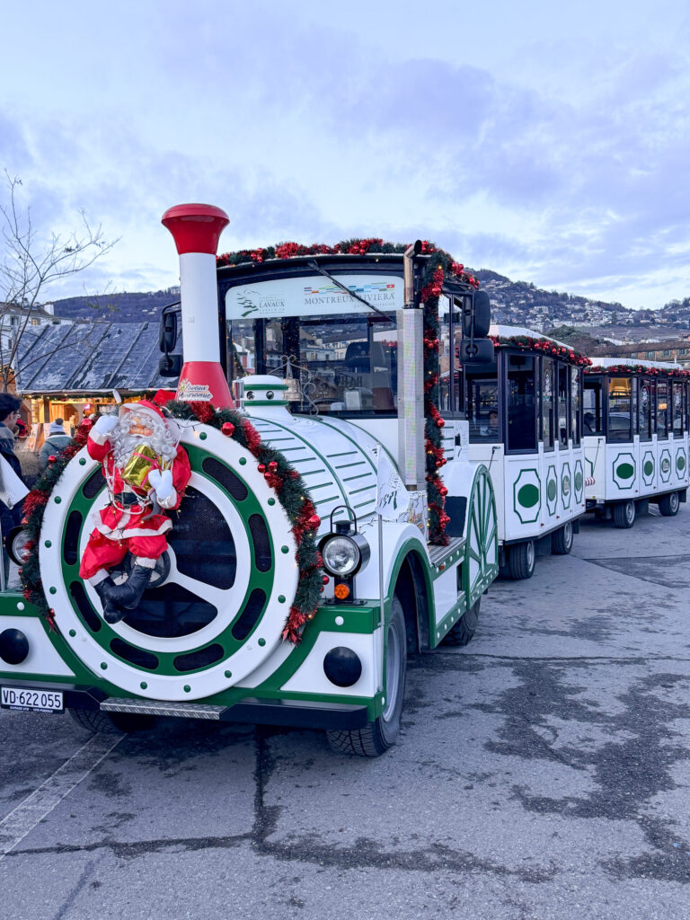 A Montreux Switzerland Christmas Market guide | An honest opinion about the Montreux Christmas market and if it deserves to be considered one of the best in Europe | Where to stay to visit the Montreux Christmas Market | Things to see near Montreux in December | what to do in the Swiss Riviera in December | How many days to spend at the Montreux Christmas market | Chateau Chillon at Christmas time | Visiting Rochers de Naye from Montreux | A day trip to Vevey | How much time to spend at Chaplins World | Is Chaplins World worth visiting | A quick stop in Gruyeres | what to do in Gruyeres | What to do in Vevey | The best luxury hotels near Montreux | The best five star hotels in Montreux | The most luxurious 5 star hotels in the Swiss Riviera | Montreal Jazz festival | What Queen things are there to see in Montreux | Freddie Mercury and Queen in Montreux 