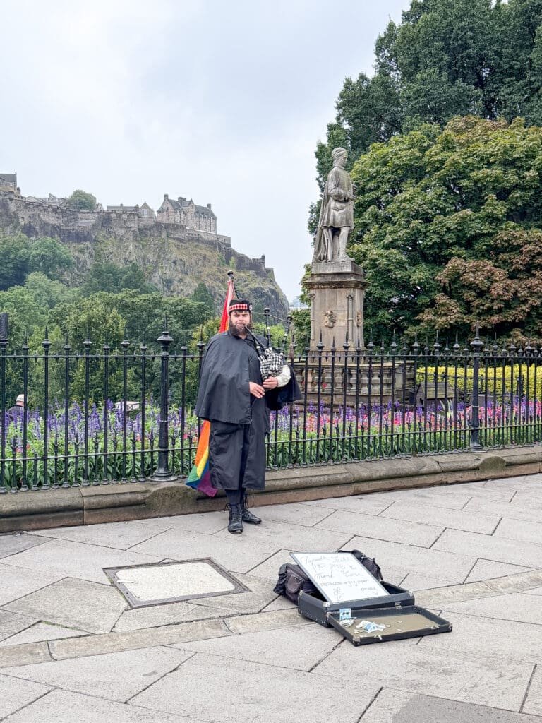 How to spend two days in Edinburgh Scotland | Best things to see and do in Edinburgh Scotland | Tips for visiting Old Town Edinburgh Scotland  | Top things to see in Edinburgh | Edinburgh tips | Edinburgh Scotland crowds | Princes Street and Scott Monument and bagpipers busking 