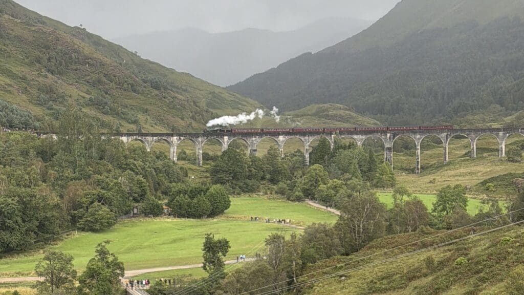 Scottish Highlands Travel Guide: Best things to do near Inverness and Glencoe | Glenfinnan Viaduct best tips for seeing the Jacobite Train and views
