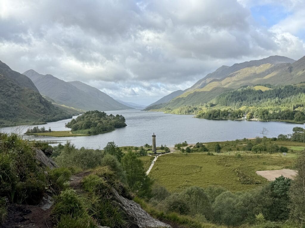 Scottish Highlands Travel Guide: Best things to do near Inverness and Glencoe | Glenfinnan Viaduct best tips for seeing the Jacobite Train and views of Loch Shiel and Glenfinnan Monument | Parking tips for Glenfinnan Viaduct including how early to get there